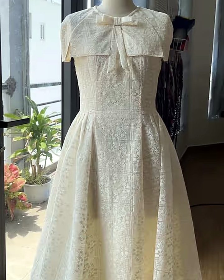 Cream lace dress with bow collar